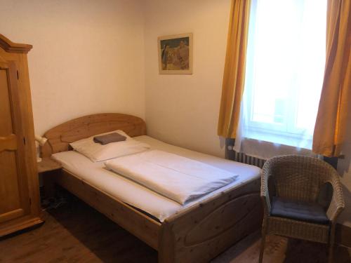 Ліжко або ліжка в номері Hotel Pension Schmellergarten