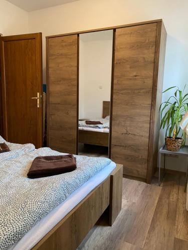 Postel nebo postele na pokoji v ubytování Marcello Wellness Apartment