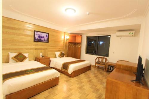 Giường trong phòng chung tại Himalaya Sapa Hostel