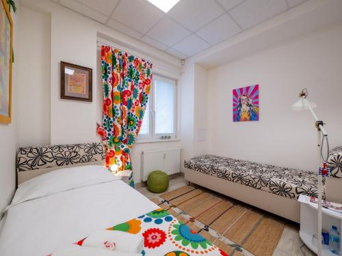 Apartmany Style tesisinde bir odada yatak veya yataklar