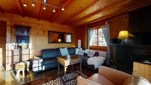 Гостиная зона в Apartment at the bottom of the slopes in Crans-Montana, cosy atmosphere