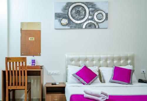 Postel nebo postele na pokoji v ubytování Nexstay Treats Inn