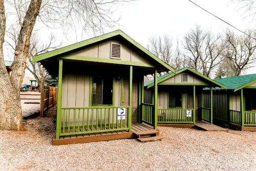 two small green homes with green roofs at Garden of the Gods RV Resort in Colorado Springs