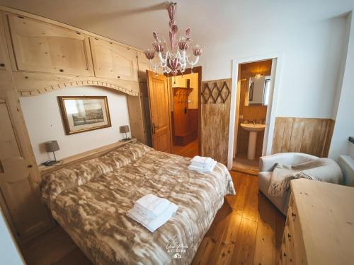 Una cama o camas en una habitación de Una Perla a Cortina