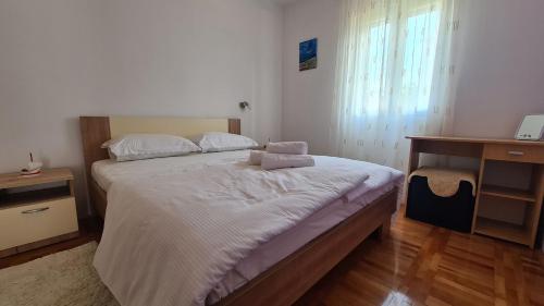 Apartment Antonia tesisinde bir odada yatak veya yataklar