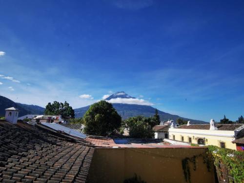 a view of a mountain in the distance at Hotel Posada San Pedro in Antigua Guatemala