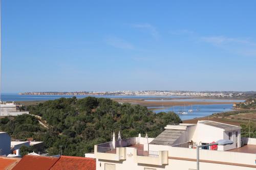 a view of the ocean from a building at ROOF TOP SEA VIEW ALVOR in Alvor