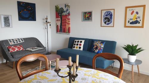 Ruang duduk di Bastia Appartement 3 chambres vue mer