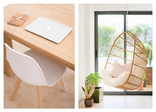 un bureau avec une chaise et une balançoire dans l'établissement Villa Boho, à Lagos