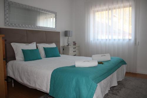 Tempat tidur dalam kamar di Casa Sandra - Apartamento Carlota