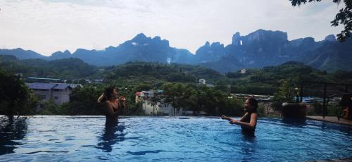 Piscina a Tujia folk houses o a prop