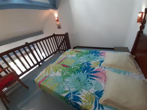 Giường trong phòng chung tại Appartement Paradis