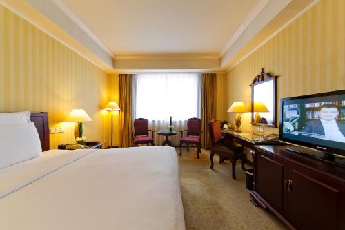 Clarion Hotel Tianjin 객실 침대