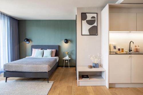 Cama ou camas em um quarto em ipartment Böblingen Region Stuttgart