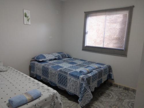 Cama ou camas em um quarto em CASA TEMPORADA - PARA 05 PESSOAS