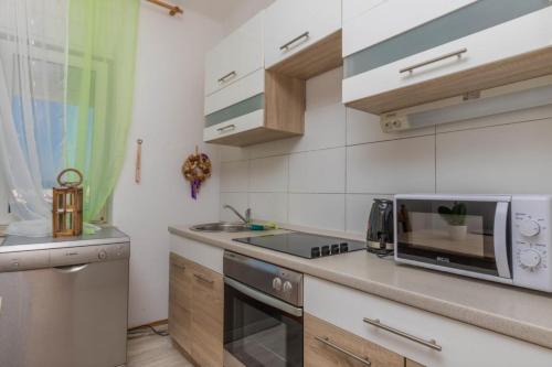 Una cocina o cocineta en Studio Apartment Iva