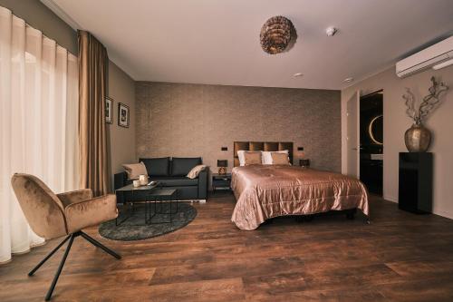 Ліжко або ліжка в номері Stadshotel Weert