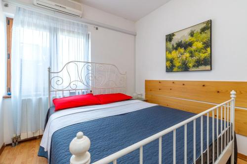 Ένα ή περισσότερα κρεβάτια σε δωμάτιο στο Apartments Jolanda