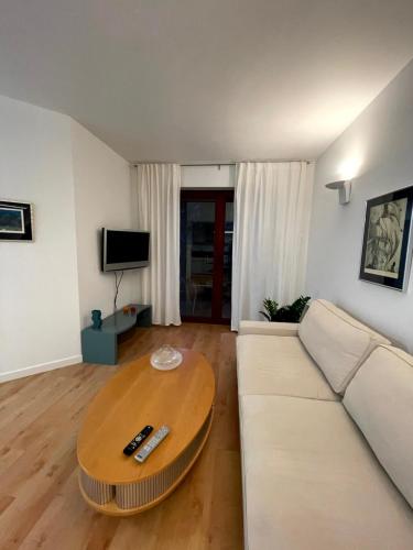 TV a/nebo společenská místnost v ubytování Apartament Jurata 30