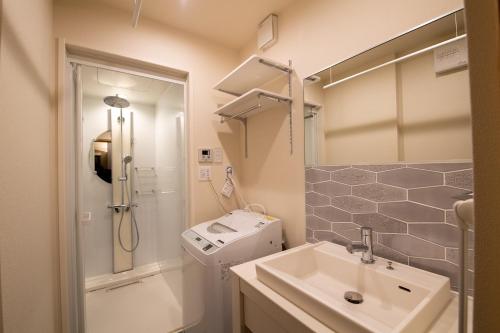 Un baño de Hotel Celeste Shizuoka