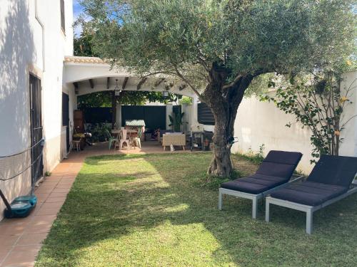 Jardí fora de Casa ChillOut a 6km de Sevilla Piscina comunitaria