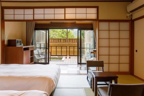 Kama o mga kama sa kuwarto sa Hakone Kowakien Mikawaya Ryokan