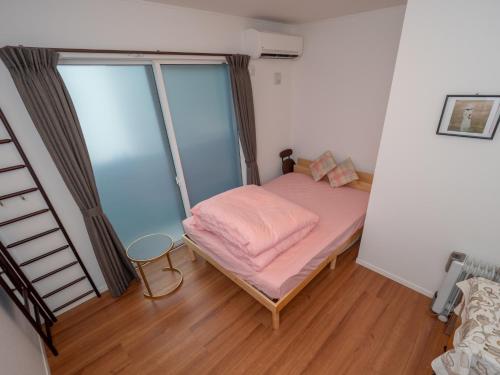 מיטה או מיטות בחדר ב-Kamakura International House Double Room w Shower Toilette - Vacation STAY 11408