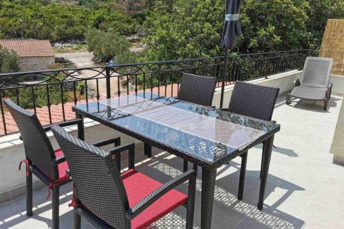 En balkon eller terrasse på Deluxe apartman “ Koromačna”