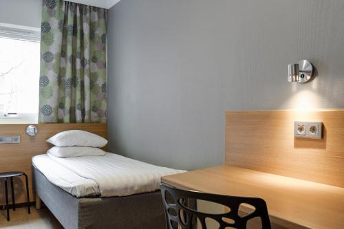 Gulta vai gultas numurā naktsmītnē Göteborgs Mini-Hotel