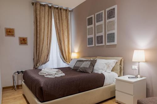 Posteľ alebo postele v izbe v ubytovaní Sweet Stay In Rome