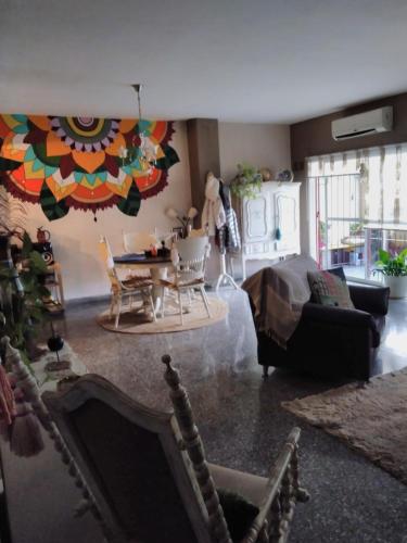 a living room with a couch and a table at Mi Lugar en el Mundo in Buenos Aires