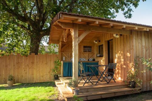 Vườn quanh Joli chalet en bois à 7 mn des plages du Bassin d'Arcachon