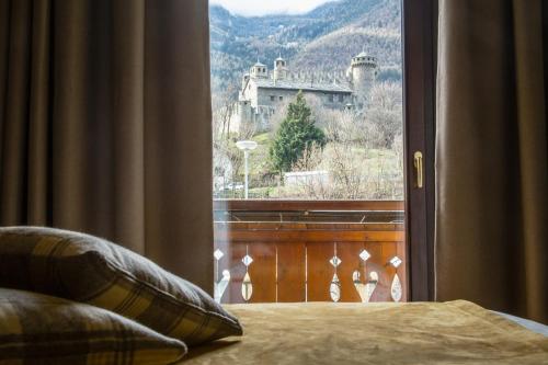 Ліжко або ліжка в номері Hotel Comtes De Challant Albergo Etico Valle d'Aosta