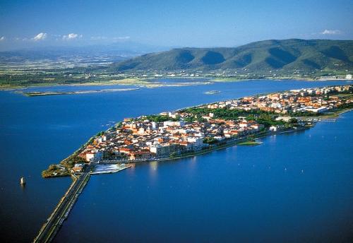 an island in the middle of a large body of water at Albergo La Perla in Orbetello