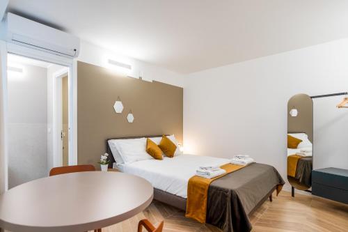 Vuode tai vuoteita majoituspaikassa DOMO Premium Apartments - Trieste Mazzini