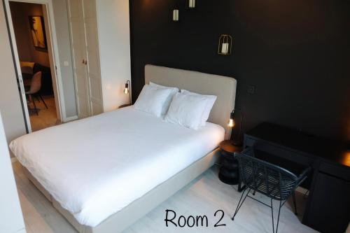 A bed or beds in a room at 3 Room Luxury Design Apartment with Airconditioning, Close to Gent St-Pieters Station