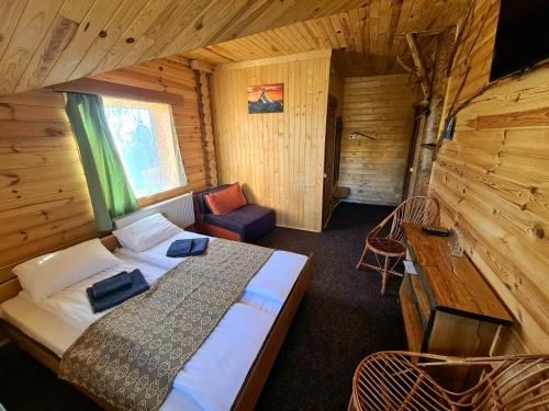 Krevet ili kreveti u jedinici u objektu Alpin Eco Chalet & Wellness