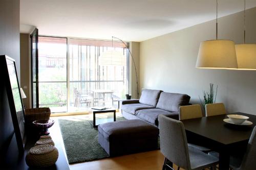 Area tempat duduk di Passeig de gracia sun apartament balcony 2 bedroo