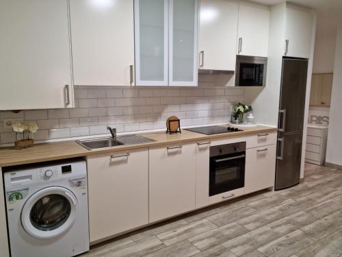 Dapur atau dapur kecil di Apartamento La Plaza