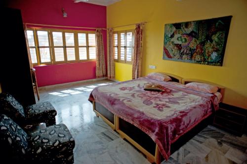 Krevet ili kreveti u jedinici u okviru objekta Ganpati Guest House