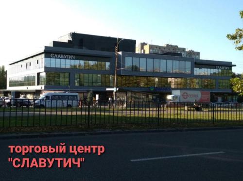 a building with a lot of windows in front of a street at Apartment on Tytova 8 in Dnipro