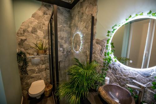 Baðherbergi á JUNGLE ROOM évadez vous cosy luxe gare autoroute