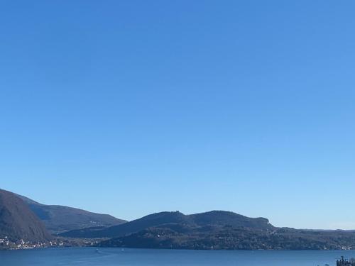 a view of a lake with mountains in the background at Sole in Verbania