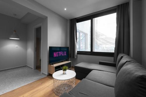 TV i/ili zabavni centar u objektu Nemea Apartments, The Luxury Suites