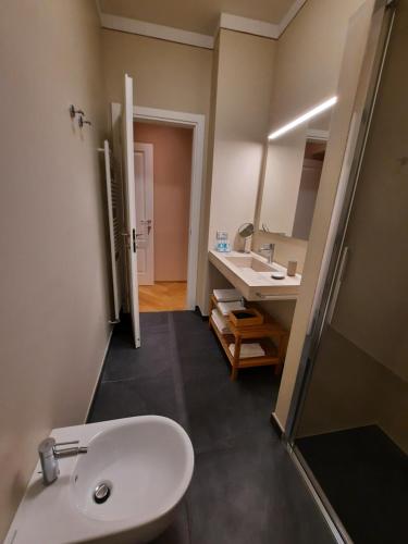 a bathroom with a sink and a mirror at Al Molo di Sant'Agostino in Como