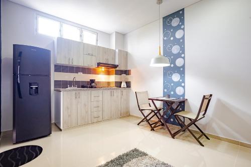 A kitchen or kitchenette at Ayenda Montepinares