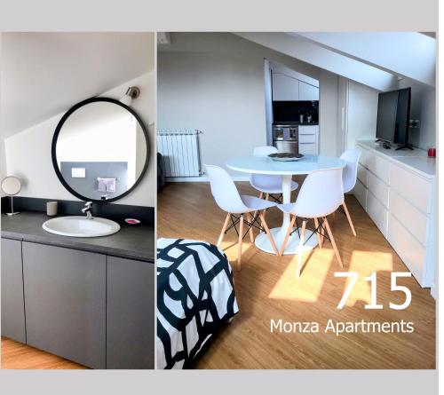 una camera con tavolo e specchio e un bagno di Monza Apartments a Monza