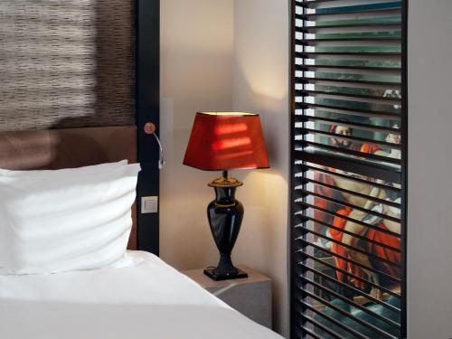 The Dominican, Brussels, a Member of Design Hotels 객실 침대