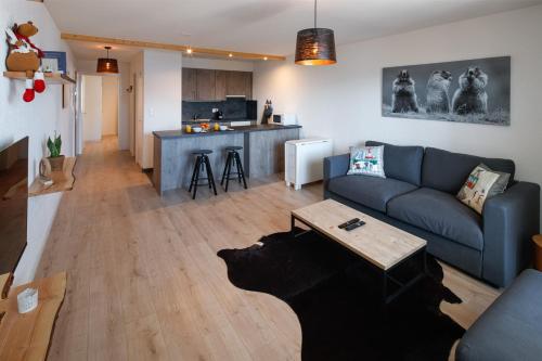 Majoituspaikan Magnifique appartement proche du centre et du ski keittiö tai keittotila