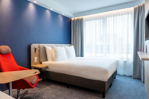 Krevet ili kreveti u jedinici u okviru objekta Holiday Inn Express - Almere, an IHG Hotel